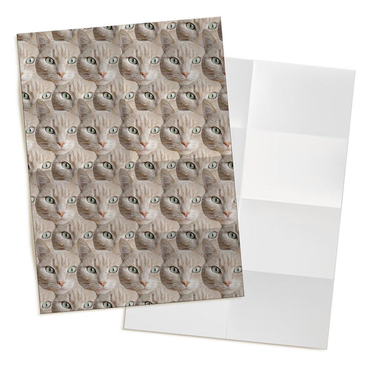 cat-faces-printed-wrapping-paper